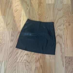 Black faux leather mini skirt